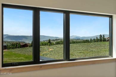 Situated amongst the serene grandeur of Granby Ranch, this on Headwaters Golf Course At Granby Ranch in Colorado - for sale on GolfHomes.com, golf home, golf lot