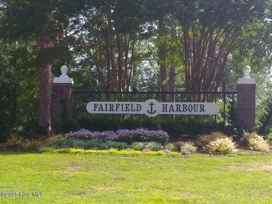 Resort community living is waiting for you.  This 2bd/2ba condo on Harbour Point Golf Club in North Carolina - for sale on GolfHomes.com, golf home, golf lot