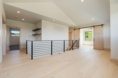 Situated amongst the serene grandeur of Granby Ranch, this on Headwaters Golf Course At Granby Ranch in Colorado - for sale on GolfHomes.com, golf home, golf lot