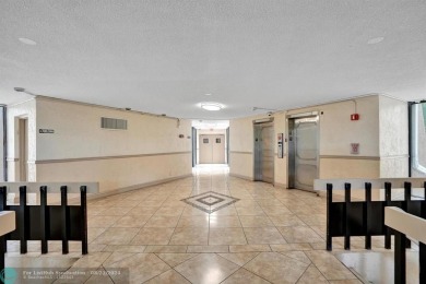 Spacious 2 bed, 2 bath condo with a private balcony and golf on Inverrary Country Club in Florida - for sale on GolfHomes.com, golf home, golf lot