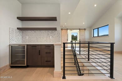 Situated amongst the serene grandeur of Granby Ranch, this on Headwaters Golf Course At Granby Ranch in Colorado - for sale on GolfHomes.com, golf home, golf lot