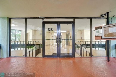Spacious 2 bed, 2 bath condo with a private balcony and golf on Inverrary Country Club in Florida - for sale on GolfHomes.com, golf home, golf lot