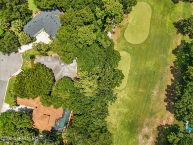 If you enjoy socializing and entertaining, this five-bedroom on Queens Harbour Yacht and Country Club in Florida - for sale on GolfHomes.com, golf home, golf lot