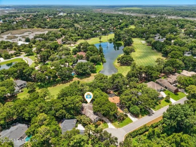 If you enjoy socializing and entertaining, this five-bedroom on Queens Harbour Yacht and Country Club in Florida - for sale on GolfHomes.com, golf home, golf lot