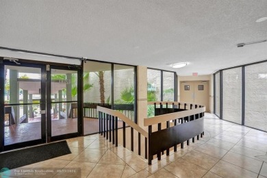 Spacious 2 bed, 2 bath condo with a private balcony and golf on Inverrary Country Club in Florida - for sale on GolfHomes.com, golf home, golf lot