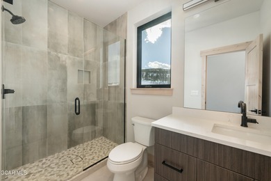 Situated amongst the serene grandeur of Granby Ranch, this on Headwaters Golf Course At Granby Ranch in Colorado - for sale on GolfHomes.com, golf home, golf lot