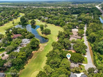 If you enjoy socializing and entertaining, this five-bedroom on Queens Harbour Yacht and Country Club in Florida - for sale on GolfHomes.com, golf home, golf lot