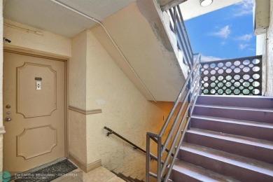 Spacious 2 bed, 2 bath condo with a private balcony and golf on Inverrary Country Club in Florida - for sale on GolfHomes.com, golf home, golf lot