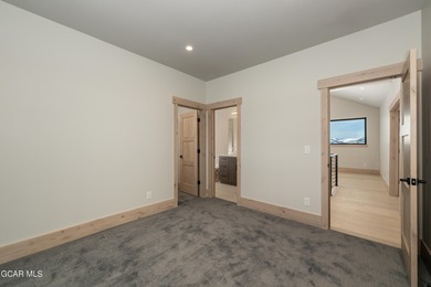 Situated amongst the serene grandeur of Granby Ranch, this on Headwaters Golf Course At Granby Ranch in Colorado - for sale on GolfHomes.com, golf home, golf lot