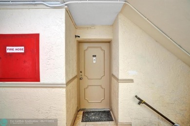 Spacious 2 bed, 2 bath condo with a private balcony and golf on Inverrary Country Club in Florida - for sale on GolfHomes.com, golf home, golf lot