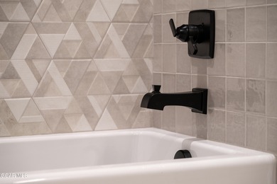 Situated amongst the serene grandeur of Granby Ranch, this on Headwaters Golf Course At Granby Ranch in Colorado - for sale on GolfHomes.com, golf home, golf lot