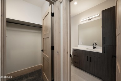 Situated amongst the serene grandeur of Granby Ranch, this on Headwaters Golf Course At Granby Ranch in Colorado - for sale on GolfHomes.com, golf home, golf lot