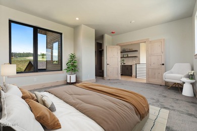 Situated amongst the serene grandeur of Granby Ranch, this on Headwaters Golf Course At Granby Ranch in Colorado - for sale on GolfHomes.com, golf home, golf lot