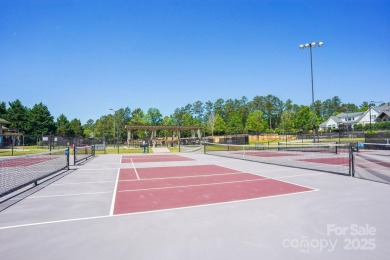 Experience lakefront living in this stunning 4-bedroom, 3.5-bath on The Palisades Country Club in North Carolina - for sale on GolfHomes.com, golf home, golf lot
