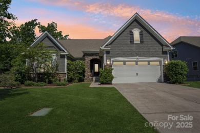 Experience lakefront living in this stunning 4-bedroom, 3.5-bath on The Palisades Country Club in North Carolina - for sale on GolfHomes.com, golf home, golf lot