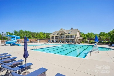 Experience lakefront living in this stunning 4-bedroom, 3.5-bath on The Palisades Country Club in North Carolina - for sale on GolfHomes.com, golf home, golf lot