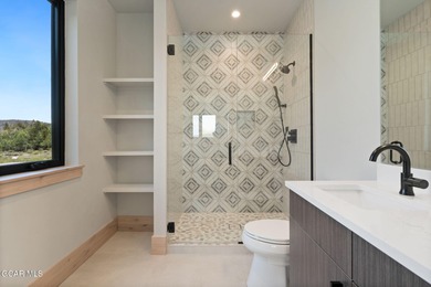 Situated amongst the serene grandeur of Granby Ranch, this on Headwaters Golf Course At Granby Ranch in Colorado - for sale on GolfHomes.com, golf home, golf lot