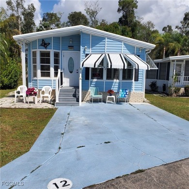 Gorgeous, spaceous manufactured home in Corkscrew Woodlands an on Copperleaf Golf Club in Florida - for sale on GolfHomes.com, golf home, golf lot