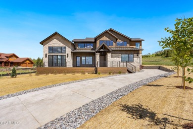 Situated amongst the serene grandeur of Granby Ranch, this on Headwaters Golf Course At Granby Ranch in Colorado - for sale on GolfHomes.com, golf home, golf lot