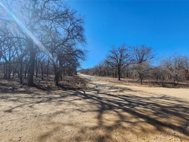 2 Corner lots with Mature Oak trees. Great building site .66 of on Nocona Hills Golf Course in Texas - for sale on GolfHomes.com, golf home, golf lot