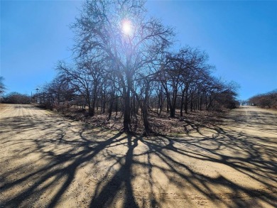 2 Corner lots with Mature Oak trees. Great building site .66 of on Nocona Hills Golf Course in Texas - for sale on GolfHomes.com, golf home, golf lot