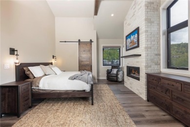 Exquisite Mountain Modern Retreat with Luxe Finishes Throughout on Raven Golf Club At Three Peaks in Colorado - for sale on GolfHomes.com, golf home, golf lot