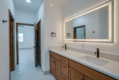 NEW CONSTRUCTION. Featuring three bedrooms and two bathrooms on Taos Country Club in New Mexico - for sale on GolfHomes.com, golf home, golf lot