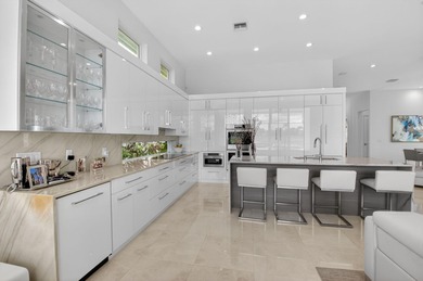 Experience refined living in this extraordinary Golf Membership on Addison Reserve in Florida - for sale on GolfHomes.com, golf home, golf lot