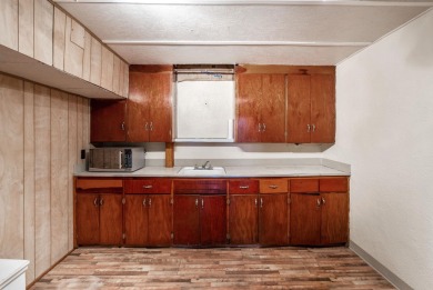 Welcome home to this move-in ready, 2 bedroom, 1 bath home on MacDonald Golf Course in Kansas - for sale on GolfHomes.com, golf home, golf lot