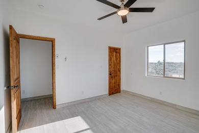 NEW CONSTRUCTION. Featuring three bedrooms and two bathrooms on Taos Country Club in New Mexico - for sale on GolfHomes.com, golf home, golf lot