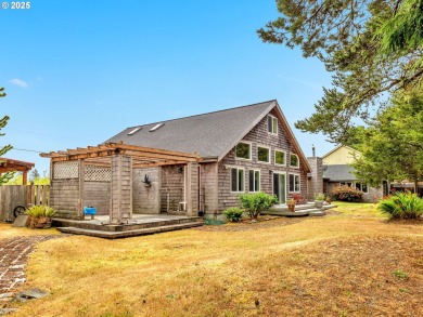 Enjoy lake and golf course views from this beautifully appointed on Astoria Golf and Country Club in Oregon - for sale on GolfHomes.com, golf home, golf lot