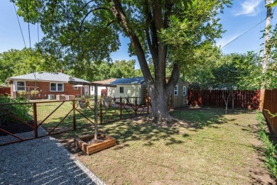 Welcome home to this move-in ready, 2 bedroom, 1 bath home on MacDonald Golf Course in Kansas - for sale on GolfHomes.com, golf home, golf lot