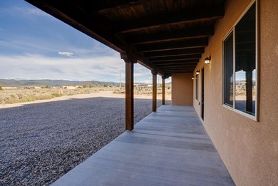 NEW CONSTRUCTION. Featuring three bedrooms and two bathrooms on Taos Country Club in New Mexico - for sale on GolfHomes.com, golf home, golf lot