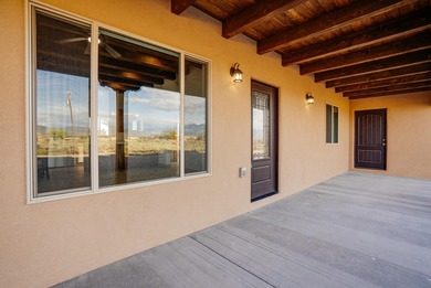 NEW CONSTRUCTION. Featuring three bedrooms and two bathrooms on Taos Country Club in New Mexico - for sale on GolfHomes.com, golf home, golf lot