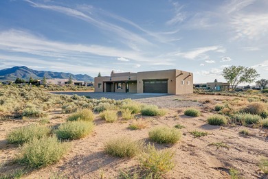 NEW CONSTRUCTION. Featuring three bedrooms and two bathrooms on Taos Country Club in New Mexico - for sale on GolfHomes.com, golf home, golf lot