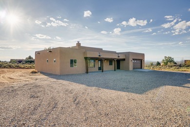 NEW CONSTRUCTION. Featuring three bedrooms and two bathrooms on Taos Country Club in New Mexico - for sale on GolfHomes.com, golf home, golf lot