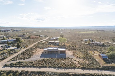 NEW CONSTRUCTION. Featuring three bedrooms and two bathrooms on Taos Country Club in New Mexico - for sale on GolfHomes.com, golf home, golf lot