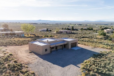 NEW CONSTRUCTION. Featuring three bedrooms and two bathrooms on Taos Country Club in New Mexico - for sale on GolfHomes.com, golf home, golf lot