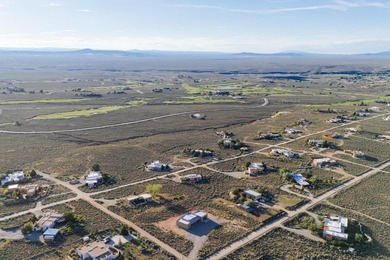 NEW CONSTRUCTION. Featuring three bedrooms and two bathrooms on Taos Country Club in New Mexico - for sale on GolfHomes.com, golf home, golf lot