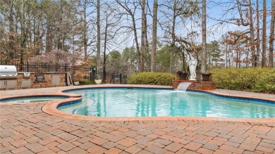 PRICED TO SELL! A RARE FIND!  This four-sided brick RANCH-style on Laurel Springs Golf Club in Georgia - for sale on GolfHomes.com, golf home, golf lot