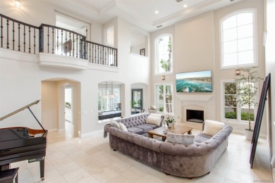 Step into timeless elegance with this custom-built executive on Four Seasons Resort Aviara Golf Club in California - for sale on GolfHomes.com, golf home, golf lot