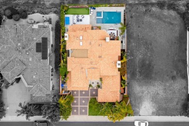 Step into timeless elegance with this custom-built executive on Four Seasons Resort Aviara Golf Club in California - for sale on GolfHomes.com, golf home, golf lot