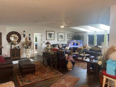 Discover this stunning triple-wide manufactured home in on Schalamar Creek Golf and Country Club in Florida - for sale on GolfHomes.com, golf home, golf lot