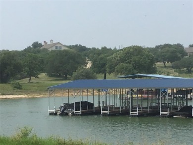 Great Lot with distant water view, partially cleared, backs up on White Bluff Resort - Old Course in Texas - for sale on GolfHomes.com, golf home, golf lot