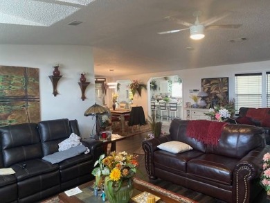 Discover this stunning triple-wide manufactured home in on Schalamar Creek Golf and Country Club in Florida - for sale on GolfHomes.com, golf home, golf lot