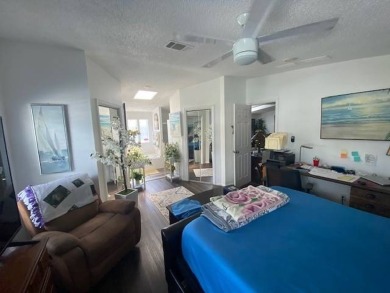 Discover this stunning triple-wide manufactured home in on Schalamar Creek Golf and Country Club in Florida - for sale on GolfHomes.com, golf home, golf lot