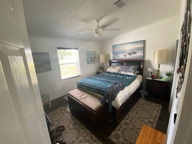 Discover this stunning triple-wide manufactured home in on Schalamar Creek Golf and Country Club in Florida - for sale on GolfHomes.com, golf home, golf lot