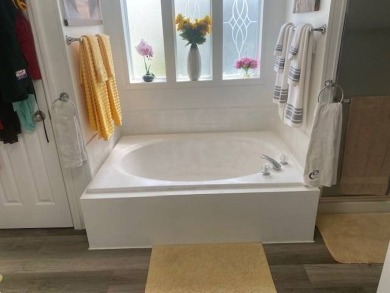 Discover this stunning triple-wide manufactured home in on Schalamar Creek Golf and Country Club in Florida - for sale on GolfHomes.com, golf home, golf lot