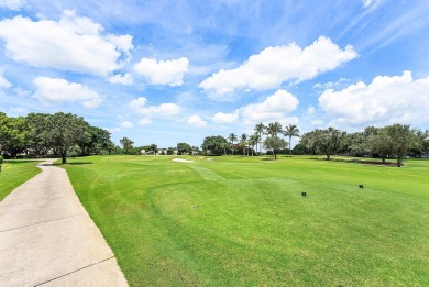The most gorgeous view in all of Cedar Cay! Beautiful updated on Broken Sound Golf and Club  in Florida - for sale on GolfHomes.com, golf home, golf lot