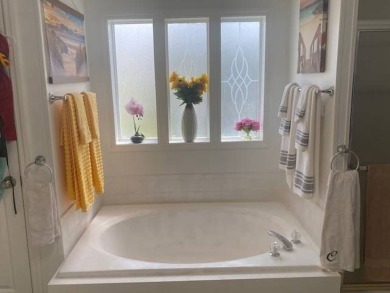 Discover this stunning triple-wide manufactured home in on Schalamar Creek Golf and Country Club in Florida - for sale on GolfHomes.com, golf home, golf lot